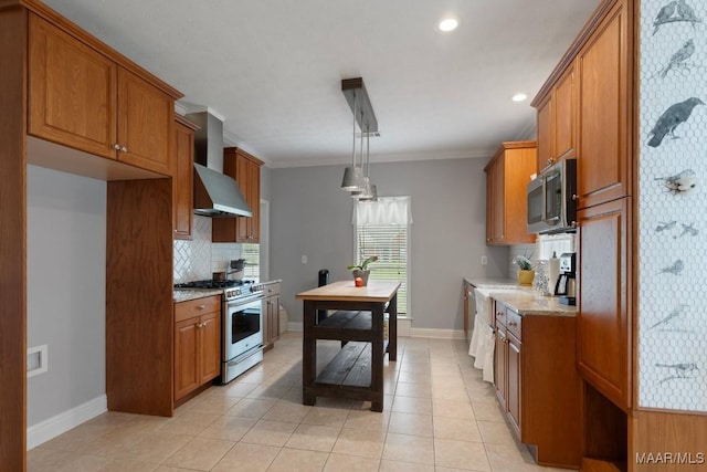 204 St Thomas Ave, Wetumpka, AL 36092 - kitchen featuring appliances with stainless steel finishes, brown cabinetry, backsplash, ornamental molding, and light stone counters