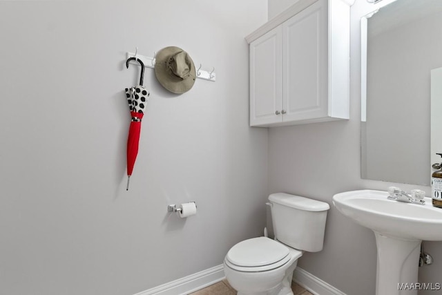 204 St Thomas Ave, Wetumpka, AL 36092 - half bath featuring baseboards and toilet