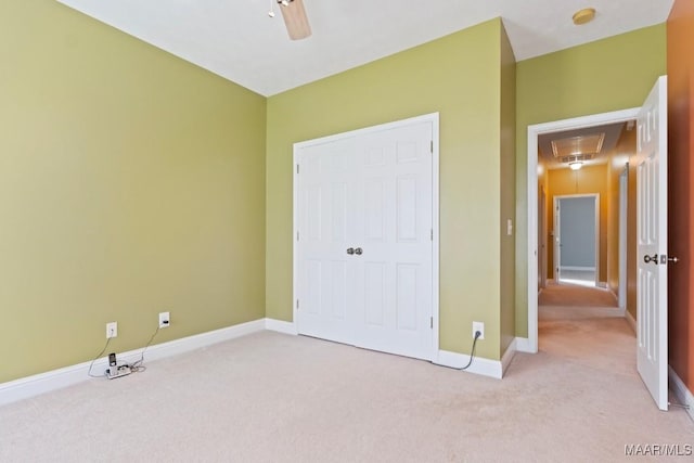 204 St Thomas Ave, Wetumpka, AL 36092 - unfurnished bedroom featuring attic access, light carpet, and a ceiling fan