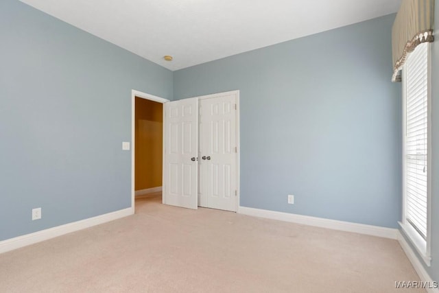 204 St Thomas Ave, Wetumpka, AL 36092 - unfurnished bedroom featuring light carpet and a closet