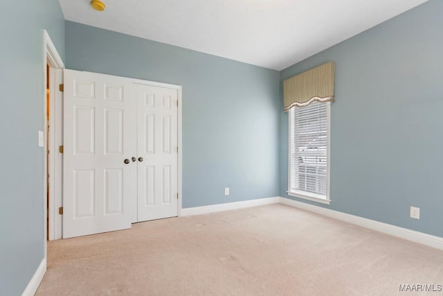 204 St Thomas Ave, Wetumpka, AL 36092 - unfurnished bedroom with carpet floors and a closet