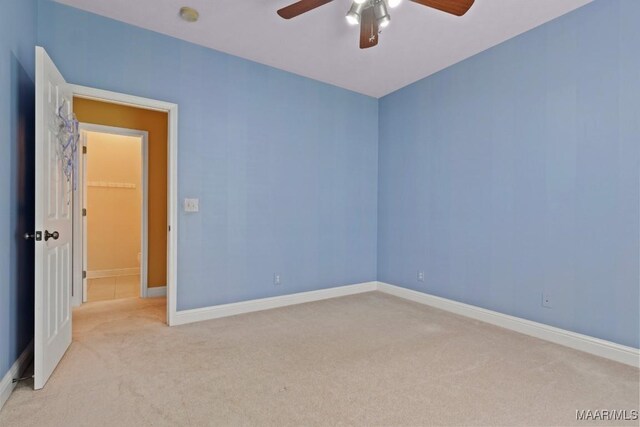 204 St Thomas Ave, Wetumpka, AL 36092 - empty room featuring carpet floors, ceiling fan, and a smoke detector
