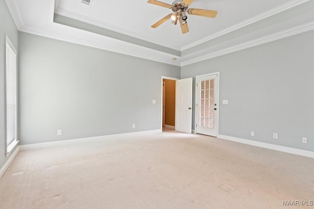 204 St Thomas Ave, Wetumpka, AL 36092 - spare room with ornamental molding, light colored carpet, ceiling fan, and a raised ceiling