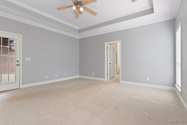 204 St Thomas Ave, Wetumpka, AL 36092 - unfurnished room with light carpet, crown molding, a ceiling fan, and a raised ceiling