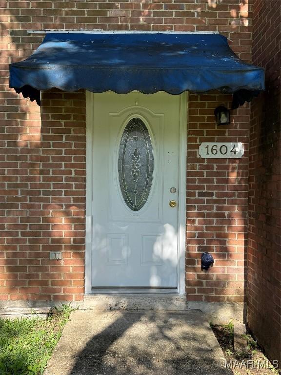 1604 Cobblestone Ct, Montgomery, AL 36117 - property entrance with brick siding