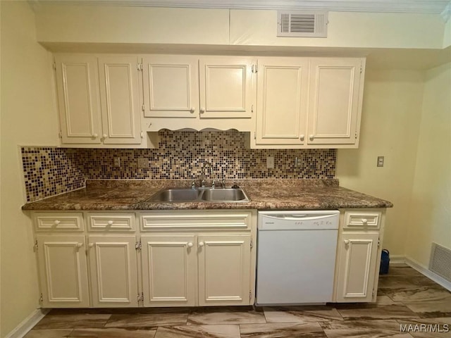 1604 Cobblestone Ct, Montgomery, AL 36117 - kitchen with white dishwasher, decorative backsplash, and white cabinets