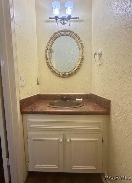 1604 Cobblestone Ct, Montgomery, AL 36117 - bathroom with vanity and a textured wall