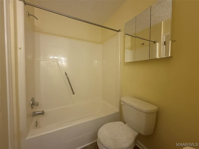 1604 Cobblestone Ct, Montgomery, AL 36117 - bathroom with shower / bath combination and a textured ceiling