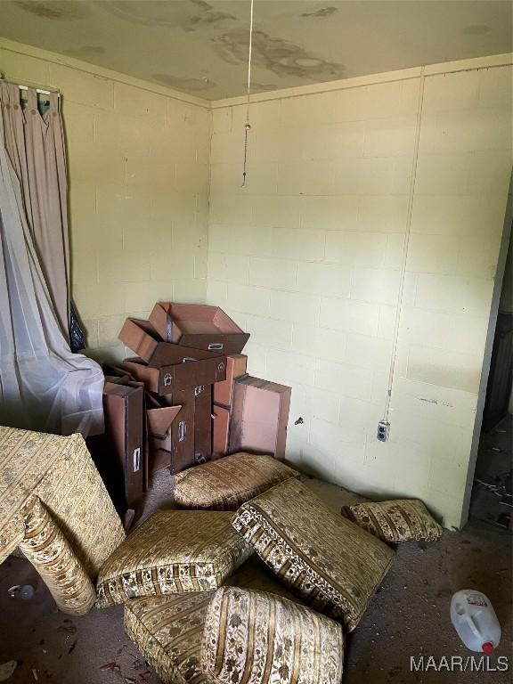 1987 Upper Wetumpka Rd, Montgomery, AL 36107 - bedroom featuring concrete block wall