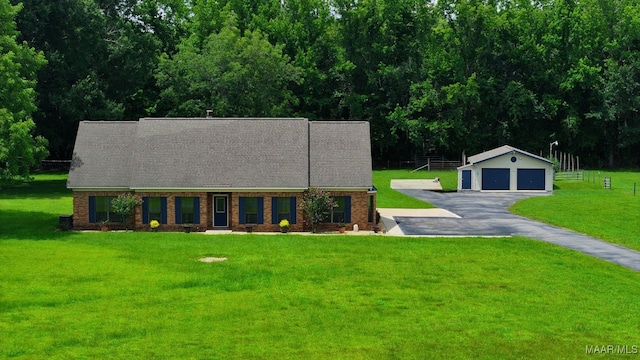 4015 Snowdoun Chambers Rd, Montgomery, AL 36116 - view of front of home with a detached garage, an outdoor structure, and a front lawn