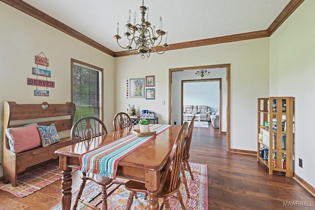 4015 Snowdoun Chambers Rd, Montgomery, AL 36116 - dining space featuring a chandelier, ornamental molding, and dark wood-style flooring