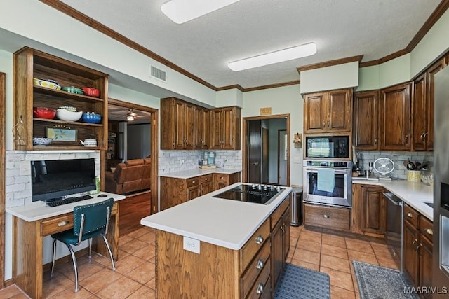 4015 Snowdoun Chambers Rd, Montgomery, AL 36116 - kitchen with black appliances, crown molding, a center island, light tile patterned floors, and tasteful backsplash