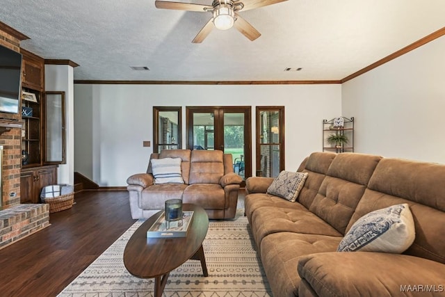 4015 Snowdoun Chambers Rd, Montgomery, AL 36116 - living area featuring wood finished floors, ceiling fan, ornamental molding, and a textured ceiling