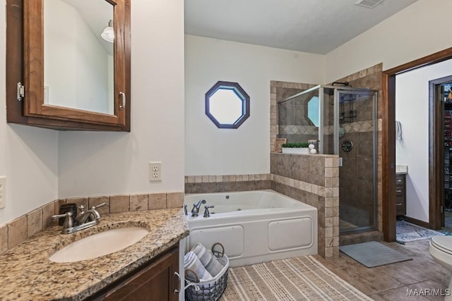 4015 Snowdoun Chambers Rd, Montgomery, AL 36116 - bathroom featuring vanity, a garden tub, and a shower stall