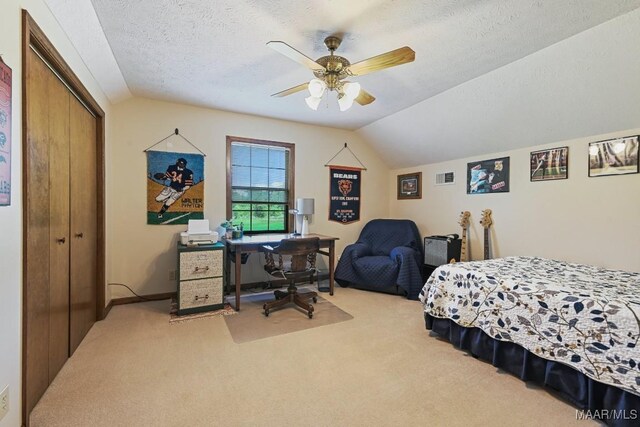 4015 Snowdoun Chambers Rd, Montgomery, AL 36116 - carpeted bedroom featuring lofted ceiling, a closet, an office area, a textured ceiling, and ceiling fan