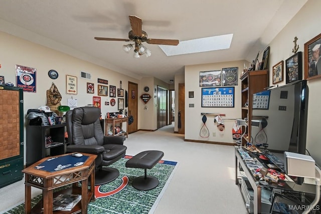 4015 Snowdoun Chambers Rd, Montgomery, AL 36116 - living area with light carpet, a skylight, and a ceiling fan