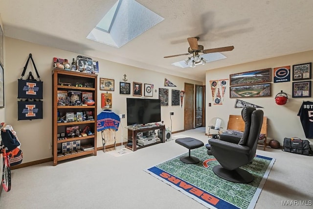 4015 Snowdoun Chambers Rd, Montgomery, AL 36116 - living area with a skylight, carpet, ceiling fan, and a textured ceiling