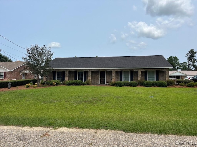 216 Cone Dr, Selma, AL 36701 - ranch-style home featuring a front yard and brick siding