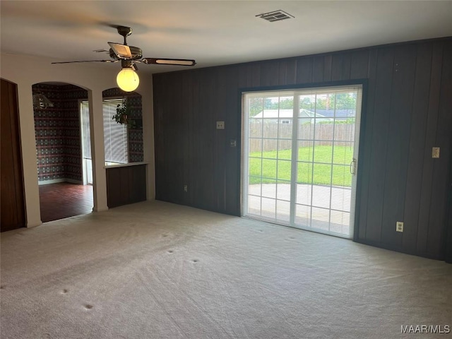 216 Cone Dr, Selma, AL 36701 - unfurnished room featuring carpet, a ceiling fan, and arched walkways