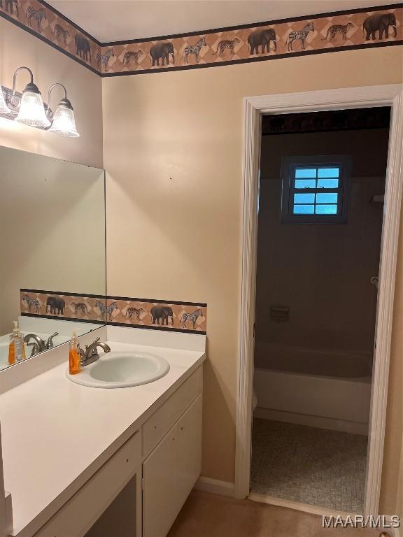 216 Cone Dr, Selma, AL 36701 - full bath featuring vanity and tub / shower combination