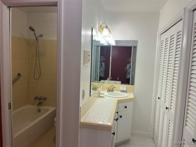216 Cone Dr, Selma, AL 36701 - full bathroom with a closet, vanity, washtub / shower combination, and tile patterned flooring