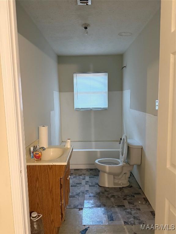 235 Wild Plum Trl, Wetumpka, AL 36093 - full bath featuring a bath, vanity, and a textured ceiling
