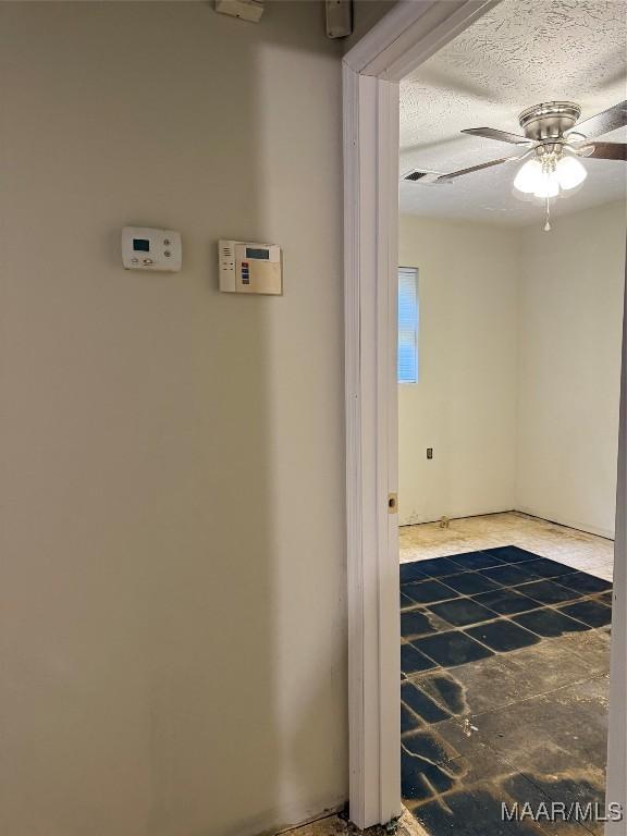 235 Wild Plum Trl, Wetumpka, AL 36093 - laundry area with a ceiling fan and a textured ceiling