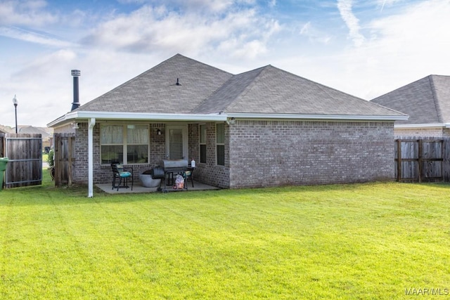6642 Triston Way, Montgomery, AL 36117 - rear view of property with roof with shingles, brick siding, and a patio area