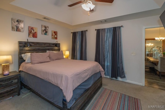 6642 Triston Way, Montgomery, AL 36117 - carpeted bedroom featuring a chandelier and ceiling fan