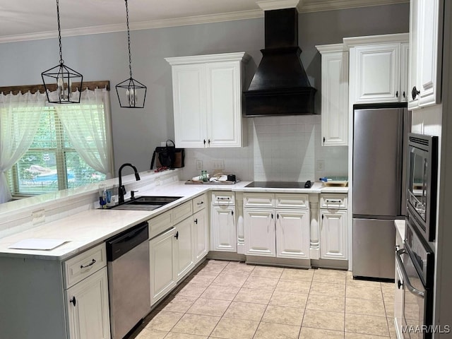 312 Sherwood Trl, Wetumpka, AL 36093 - kitchen with appliances with stainless steel finishes, premium range hood, backsplash, light countertops, and white cabinetry