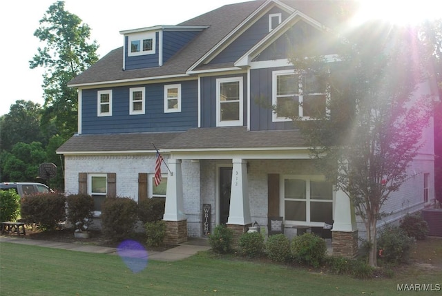 312 Sherwood Trl, Wetumpka, AL 36093 - craftsman inspired home featuring covered porch, roof with shingles, stone siding, and board and batten siding