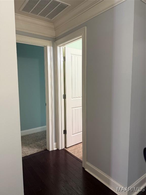 312 Sherwood Trl, Wetumpka, AL 36093 - hallway featuring wood finished floors and crown molding