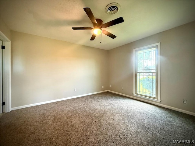 5204 Patricia Ln, Montgomery, AL 36108 - unfurnished room with dark colored carpet and ceiling fan