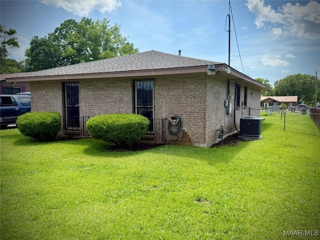 5204 Patricia Ln, Montgomery, AL 36108 - rear view of house with brick siding and roof with shingles
