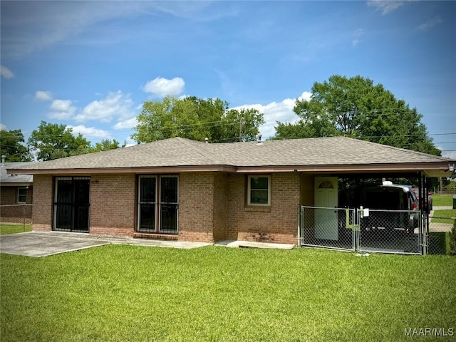 5204 Patricia Ln, Montgomery, AL 36108 - rear view of house with brick siding and roof with shingles