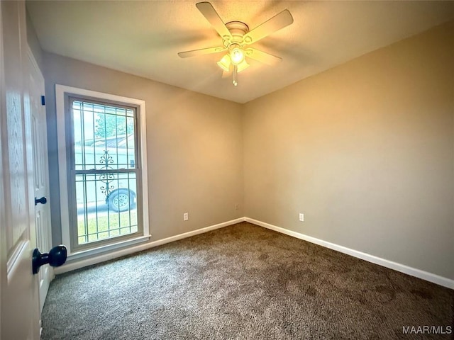 5204 Patricia Ln, Montgomery, AL 36108 - unfurnished room featuring dark colored carpet and a ceiling fan