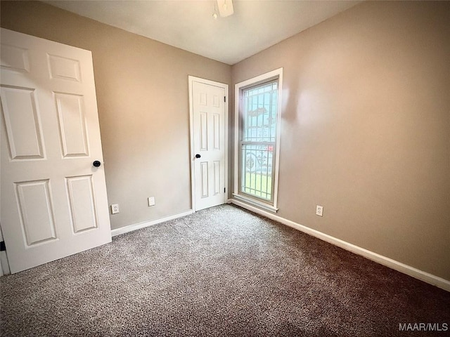 5204 Patricia Ln, Montgomery, AL 36108 - unfurnished bedroom with baseboards and carpet flooring