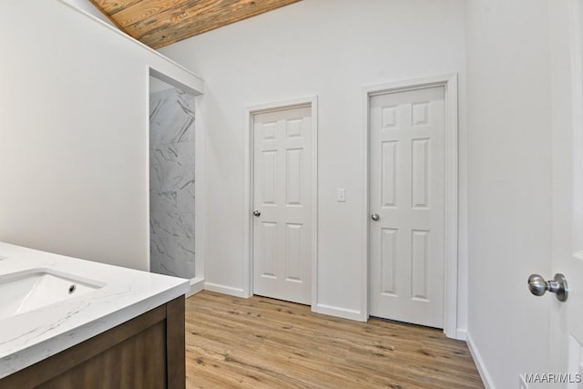 1415 Gold Mine Branch Rd, Marbury, AL 36051 - bathroom with vanity and wood finished floors