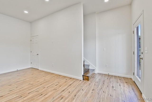 1415 Gold Mine Branch Rd, Marbury, AL 36051 - unfurnished room featuring wood finished floors, recessed lighting, plenty of natural light, and stairway