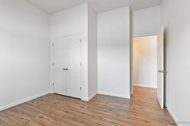1415 Gold Mine Branch Rd, Marbury, AL 36051 - unfurnished bedroom featuring wood finished floors and a closet