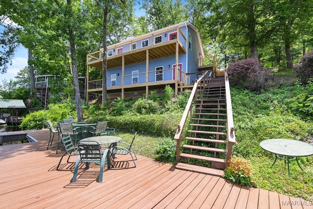 1415 Gold Mine Branch Rd, Marbury, AL 36051 - deck featuring stairway and outdoor dining space