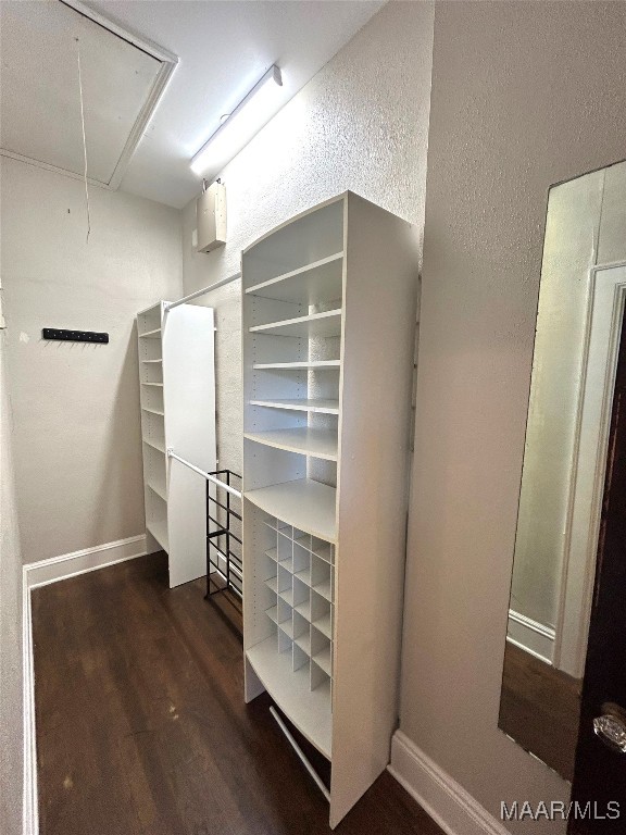 2412 College St, Montgomery, AL 36106 - spacious closet featuring attic access and wood finished floors