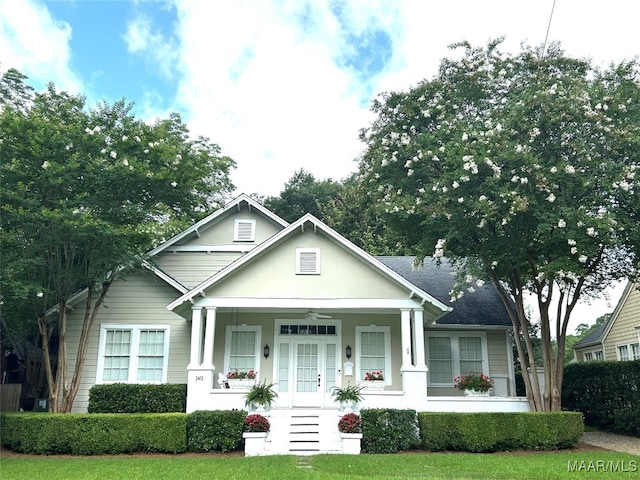 2412 College St, Montgomery, AL 36106 - view of front facade featuring a porch, ceiling fan, and a front lawn