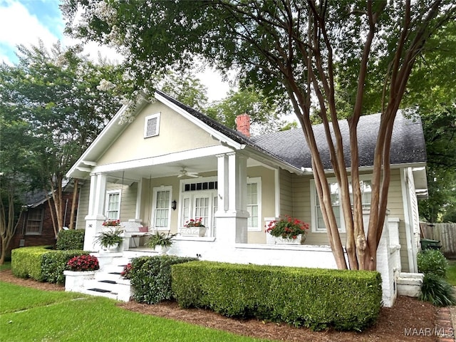 2412 College St, Montgomery, AL 36106 - view of front facade featuring a porch, a chimney, a ceiling fan, and roof with shingles