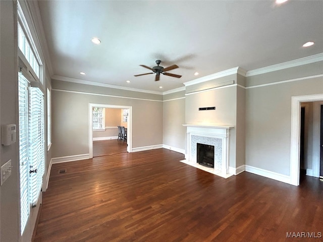 2412 College St, Montgomery, AL 36106 - unfurnished living room with ceiling fan, dark wood-style flooring, ornamental molding, recessed lighting, and a fireplace with flush hearth