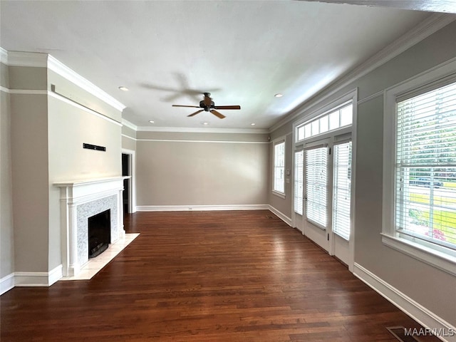 2412 College St, Montgomery, AL 36106 - unfurnished living room featuring healthy amount of natural light, ceiling fan, a fireplace with flush hearth, wood finished floors, and ornamental molding