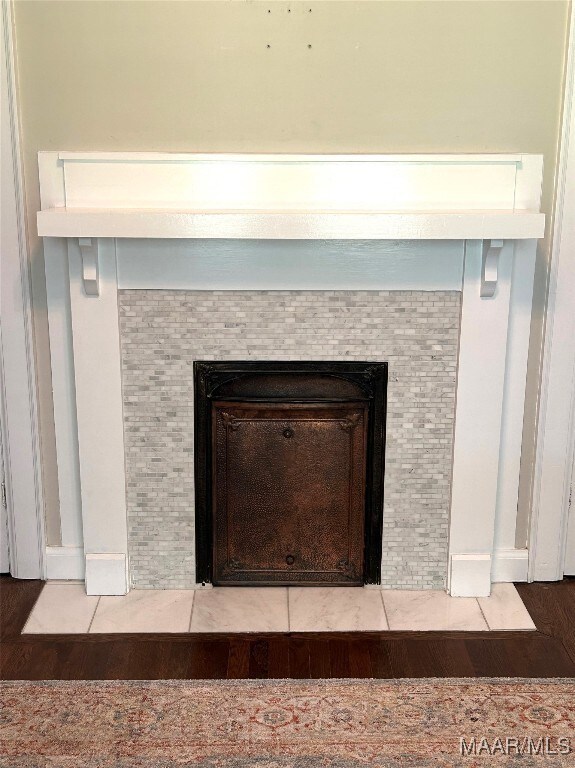 2412 College St, Montgomery, AL 36106 - detailed view of a fireplace and wood finished floors