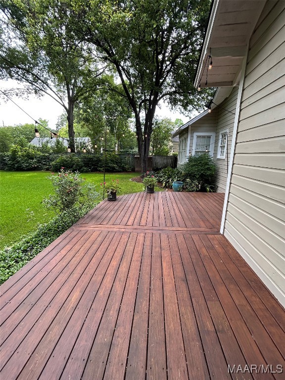 2412 College St, Montgomery, AL 36106 - wooden deck featuring a fenced backyard
