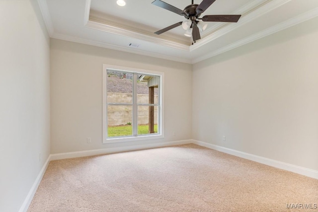79 Birchwood Ln, Wetumpka, AL 36093 - carpeted spare room featuring a tray ceiling, ornamental molding, and a ceiling fan