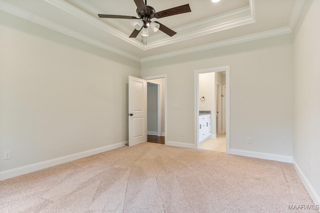 79 Birchwood Ln, Wetumpka, AL 36093 - unfurnished bedroom with ornamental molding, a raised ceiling, light colored carpet, and ensuite bathroom